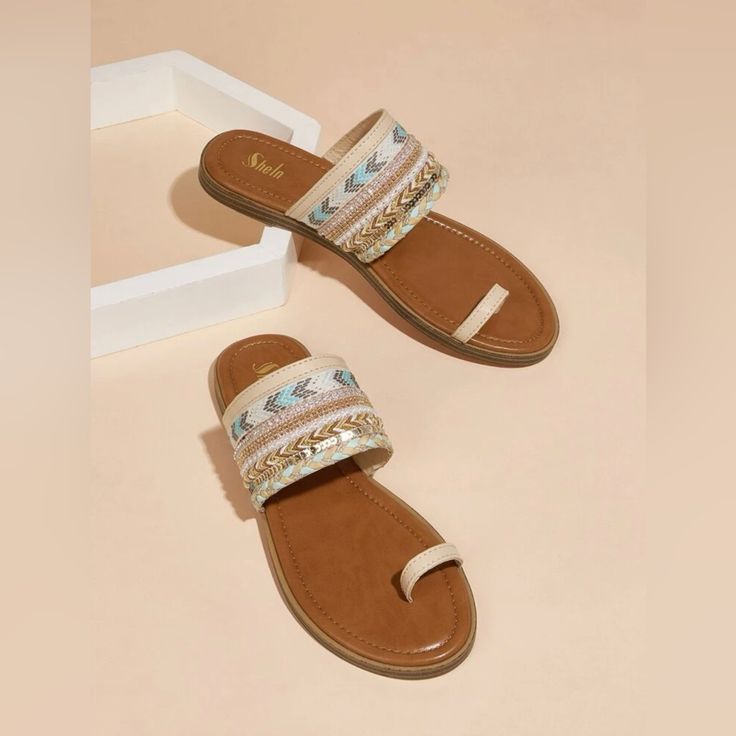 Never Worn. Too Narrow For My Feet. Beige Flat Flip Flops For Beach Season, Beige Flip Flops With Single Toe Strap For Beach, Beige Casual Flip Flops With Single Toe Strap, Beige Single Toe Strap Flip Flops For The Beach, Casual Beige Flip Flops With Single Toe Strap, Beige Flip Flops For Beach, Beige Toe Post Flip Flops For Summer, Cream Toe Post Sandals For Summer, Cream Toe Post Sandals For Beach