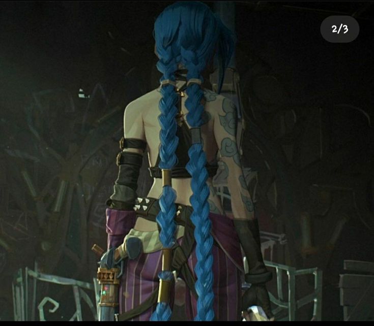 a woman with long blue hair standing in front of a stage wearing an outfit that has braids on it