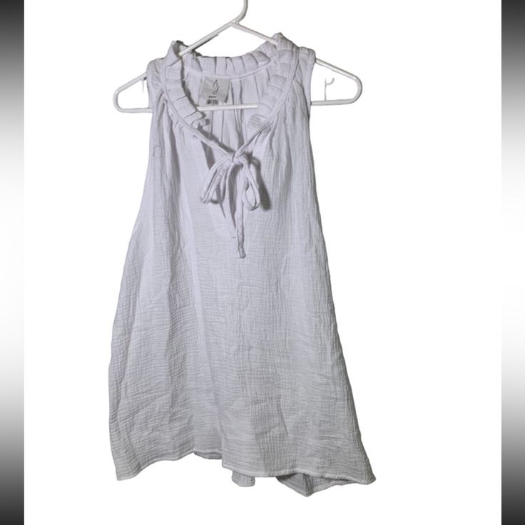 Top Joie White Sleeveless V Neck Xl Brand New Without Tags Casual Sleeveless Beach Vest, Spring Tie Neck Top For Beach, Spring Beach Tie Neck Tops, Casual Sleeveless Spring Blouse, Sleeveless Cotton Beach Vest, Sleeveless Cotton Vest For Beach, Beach Sleeveless Cotton Vest, Sleeveless Blouse For Spring Day Out, Summer Beach Blouse With Tie Neck