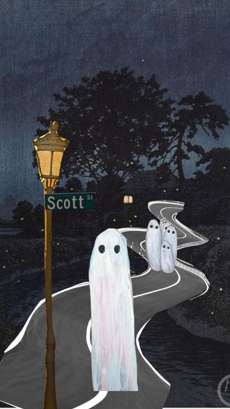 two ghostes are walking down the road in front of a street light at night