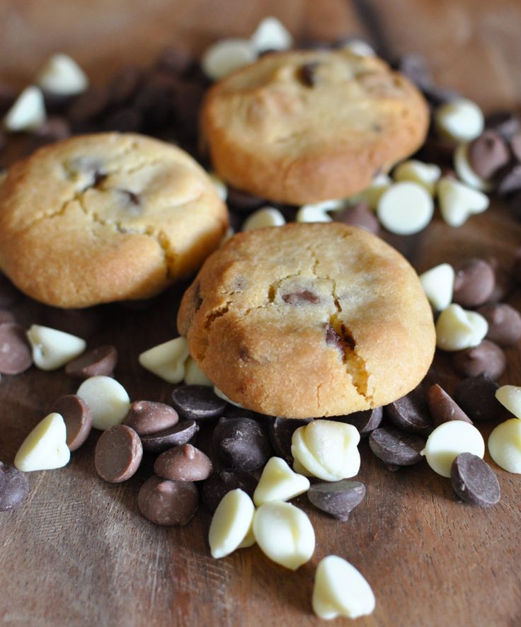 three chocolate chip cookies with white and brown chips