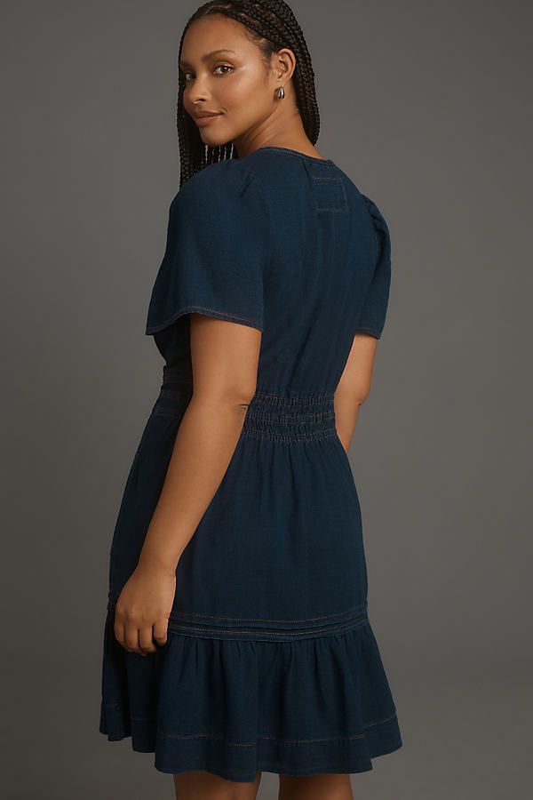 Inspired by our bestselling dress ever , the Somerset Mini Dress follows in the fan-fave’s footsteps with a flowing A-line silhouette, flattering smocked waist, and everyday-elegant tiers. | The Somerset Mini Dress: Denim Edition by The Somerset Collection by Anthropologie in Blue, Women's, Size: XS, Cotton Casual Tiered Dress With Smocked Bodice, Casual Fitted Tiered Dress With Smocked Bodice, Casual Fitted Blue Tiered Dress, Casual Fitted Midi Length Tiered Dress, Casual Tiered Dress With Smocked Back And Short Sleeves, Casual Fitted Tiered Dress With Ruffle Hem, Casual Ruched Midi Tiered Dress, Casual Fit And Flare Dress With Pleated Waist, Casual Fitted Tiered Dress For Daywear