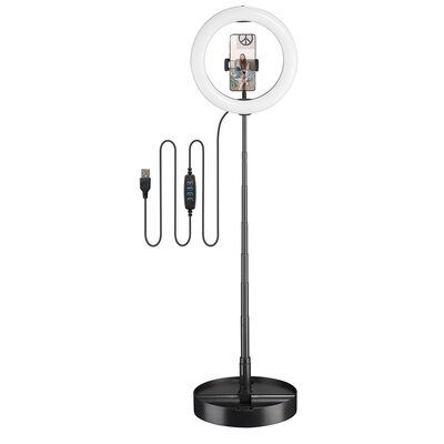 the ring light is mounted on top of a stand with two wires attached to it