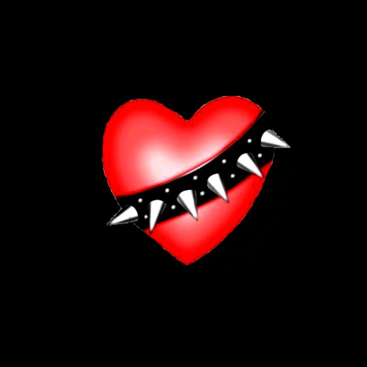 a heart with teeth and spikes on it