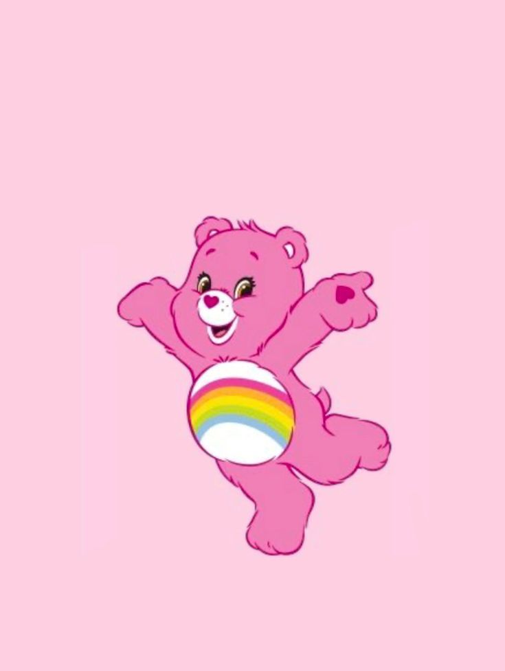 a pink teddy bear with a rainbow ball in its paws on a pink wallpaper background