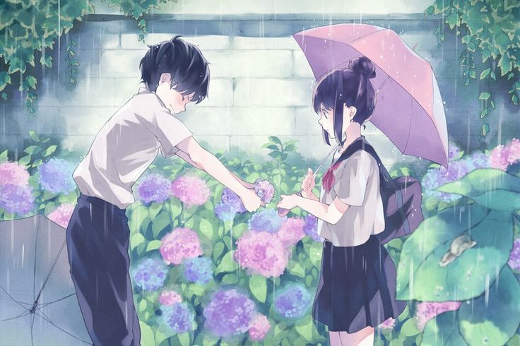 two people standing in the rain with umbrellas over their heads and flowers behind them