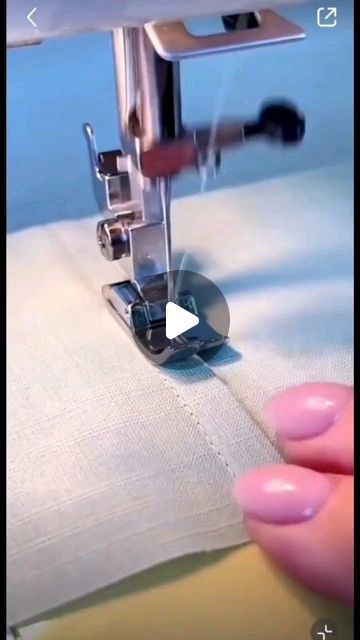 someone is using a sewing machine to sew something