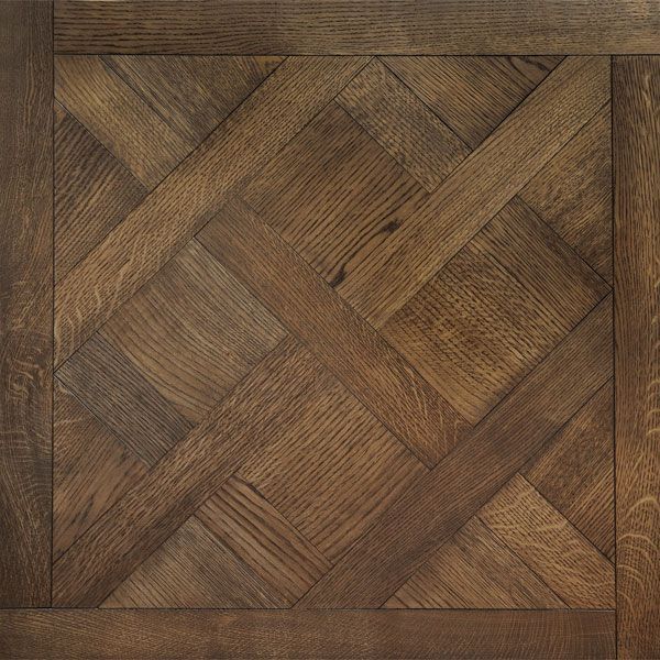 an image of wood flooring that looks like herringbones