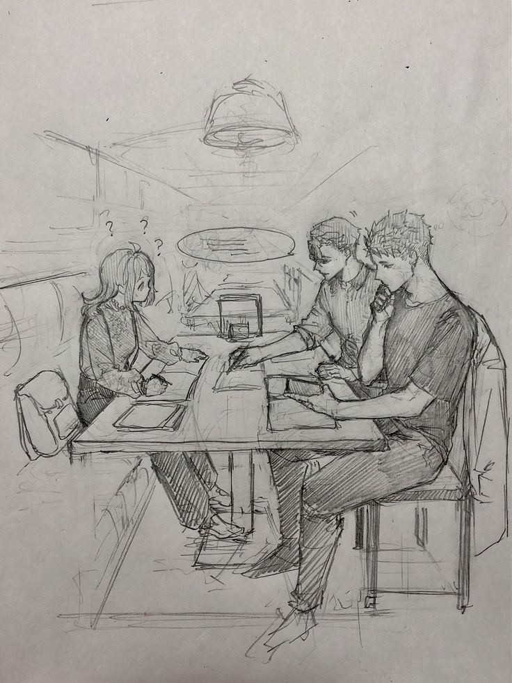 three people are sitting at a table and one person is looking at something on the phone