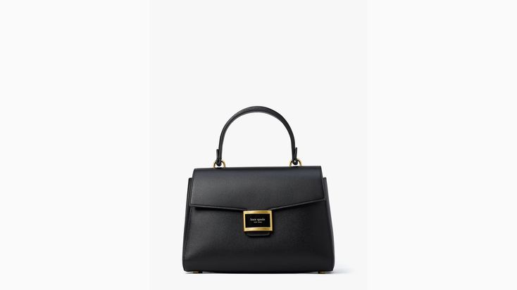 Our Katy bag gets a new look with a polished top-handle design. Done in textured leather it's the go-to bag for days when you want to feel perfectly put together. | Kate Spade Katy Medium Top-Handle Bag, Black Luxury Bags With Top Carry Handle, Luxury Medium Shoulder Bag With Detachable Handle, High-end Everyday Satchel With Top Handle, High-end Everyday Top Handle Satchel, Luxury Medium Satchel With Detachable Handle, Kate Spade Top Handle Evening Shoulder Bag, Kate Spade Evening Shoulder Bag With Detachable Handle, Kate Spade Leather Satchel For Formal Occasions, Chic Medium Satchel With Top Carry Handle