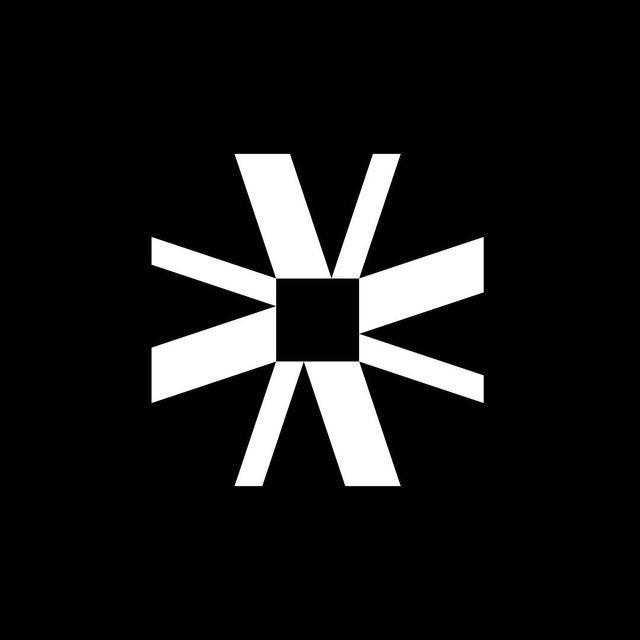 a black and white logo with the letter k in it's center, on a dark background