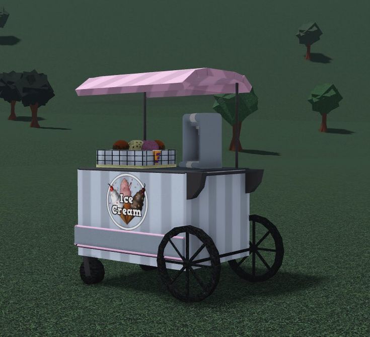 an ice cream cart with pink umbrella on top