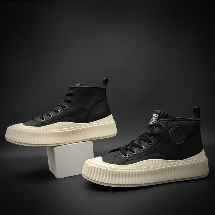 Streetwear High-top Sneakers With Branded Insole And Round Toe, Sporty Slip-on High-top Sneakers With Vulcanized Sole, High-top Sneakers With Textured Sole, Sporty Custom High-top Sneakers With Rubber Toe Cap, High-top Sneakers With Round Toe And White Sole, High-top Sneakers With White Sole And Round Toe, Casual Ankle-high Sneakers With Textured Sole, High-top Sneakers With Rubber Toe Cap And White Sole, High-top Sneakers With White Sole And Rubber Toe Cap