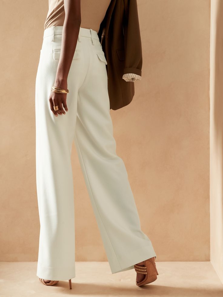 From boardroom to cocktail bar, this wide-leg trouser will have you feeling confident with an exquisitely tailored fit and a not-too-wide leg.  Crafted from a timeless all-season wool fabric from Italian mill Marzotto.  WIDE LEG FIT: High-waisted.  F Slacks For Women, Trouser Pants Women, Cocktail Bar, Wool Pants, Wool Fabric, Trouser Pants, Wide Leg Trousers, Leg Pants, Wide Leg Pants