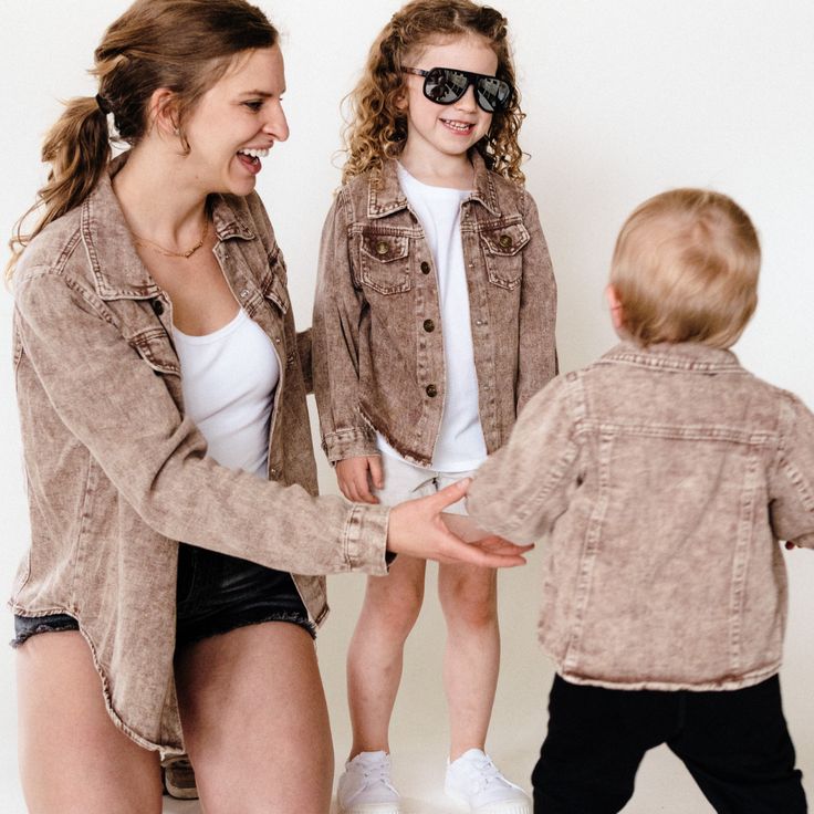 WOMEN'S- These trendy denim jackets are unique and will make you and your mini stand out! Say goodbye to heavy stiff denim and enjoy a lightweight denim fabric. The acid wash adds a cool faded vibe and is the perfect jacket for layering with versatility. This mommy and me set will become one that you reach for in your closet all the time. CHILD- Check out these mini denim jackets, perfect for your little rockstar boy or girl! Say goodbye to stiff heavy denim! These jackets have been crafted with Acid Wash Long Sleeve Denim Jacket, Faded Cotton Denim Jacket With Frayed Hem, Faded Denim Jacket With Frayed Hem, Stonewashed Cotton Denim Jacket For Fall, Faded Cotton Outerwear With Frayed Hem, Stonewashed Long Sleeve Denim Jacket For Fall, Fall Stonewashed Cotton Denim Jacket, Faded Washed Denim Jacket For Fall, Trendy Faded Long Sleeve Denim Jacket