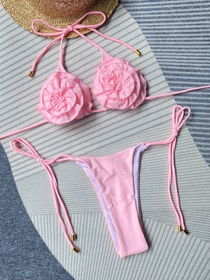 Enhance your poolside style with our Rosette Decor Triangle Bra Two-Piece Bikini Swimsuit. The intricate rosette detailing adds a touch of elegance, while the lace-up design ensures a perfect fit. Perfect for lounging or swimming, in a beautiful pink color. *Return and exchange are not supported Fitted Nylon String Swimwear, Solid Nylon Tie-side Swimwear, Adjustable Swimwear For Pool Vacation, Pink Polyamide Party Swimwear, Pink Nylon Swimwear With Lined Body, Pink Polyamide Swimwear For Vacation, Pink Party Swimwear In Polyamide, Pink Nylon Summer Swimwear, Nylon Halter Neck Swimwear