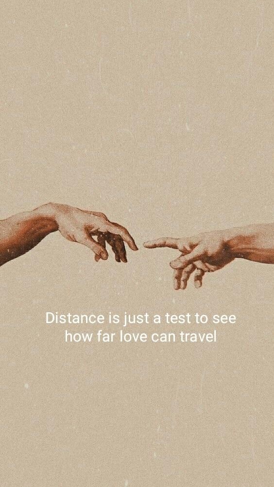 two hands reaching out towards each other with the words distance is just a test to see how far love can travel