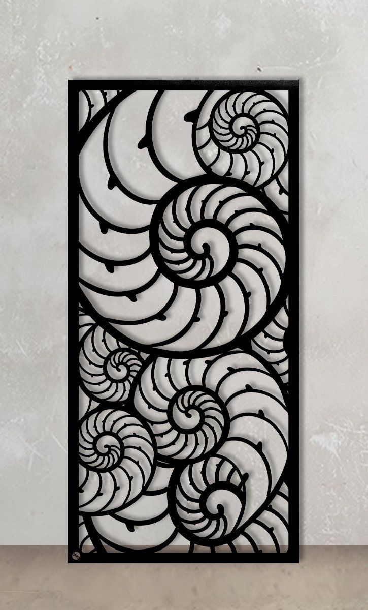 an art deco panel with black and white swirls