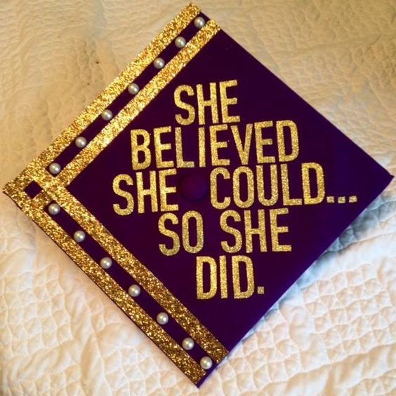 a purple and gold graduation cap that says she beliveed she could so she did