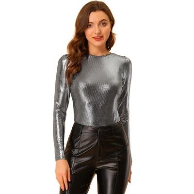 The metallic fabric adds multi-shine to this comfy and casual puff-sleeve top. A fashion evening is in the works when you wear a metallic blouse which is set with puff sleeves. Patterned in metallic, this round-neck shirt suit for a night-out, club, and parties. Wear it with wide-leg trousers or style it with leather leggings and heels for the evening. It's designed with a round neck and puff sleeves and it has textured fabric to it that sets it apart from more simplistic styles. Metallic Tops, Leggings And Heels, Sparkly Party, Party Blouse, Metallic Blouses, Halloween Long Sleeve, Round Neck Shirt, Disco Party, Casual Design