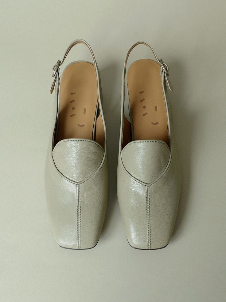 Editor's NoteHEENN presents modern chic garments and objects for your life- Subtle gloss and small pattern point- Soft touch casual mood shoes- Comfortable to wear with latex insole- Daily point item*Price may vary by options Measurements (in.)- Size: KR 220MM - KR 265MM (US 5 - 9.5)- Heel Height: 1.57 in.*If you have slim feet and low insteps, we recommend that you wear one size smaller.*If the width of your foot is normal to a little wide, we recommend that you wear your normal size.*If y Heel Outfits Casual, Spring Office Slingback Slip-on Pumps, Trendy Beige Slingback Pumps For Spring, Casual Beige Slingback Pumps With Round Toe, Modern Closed Toe Slingback Pumps For Summer, Trendy Leather Flat Heel Slingback Pumps, Modern Summer Closed Toe Slingback Pumps, Modern Slingback Pumps With Round Toe For Summer, Casual Slingback Pumps With Pointed Toe