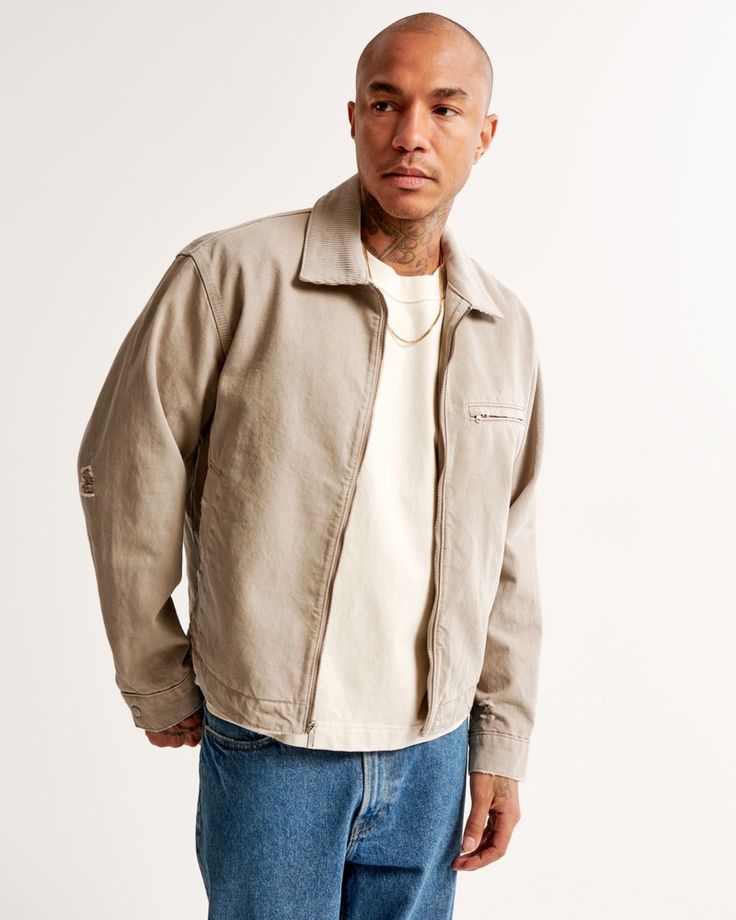 Our new trucker-style jacket in a cozy twill fabric and cropped length, featuring a relaxed-fit silhouette, left chest pocket, side pockets, corduroy fold-down collar, zip-up front and lightweight interior lining. Sporty Collared Outerwear With Pockets, Utility Cotton Outerwear With Zipper Closure, Urban Cotton Outerwear With Zipper Closure, Casual Everyday Outerwear With Side Pockets, Collared Cotton Outerwear With Zipper Closure, Urban Long Sleeve Track Jacket For Spring, Casual Long Sleeve Outerwear For Streetwear, Casual Long Sleeve Streetwear Outerwear, Spring Casual Outerwear With Side Pockets