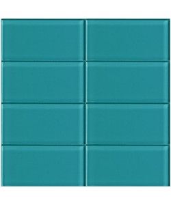 a blue tile wall with several different colors