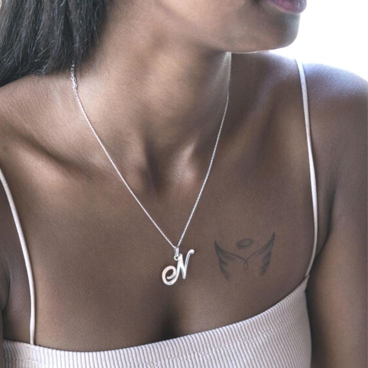 "♥This large Initial Pendant is the perfect accessory for any girl with a simple yet stylish fashion sense! the initial necklace is a real statement piece and a perfect gift for her. ♥HOW TO ORDER: Please write the initial you would like engraved as well as the desired length for the chain when placing your order. Remember to supply your FULL ADDRESS so I can ship your product out as soon as it is ready and gift-wrapped. ♥SIZE & MATERIALS: - Style: Large Initial Necklace - Material: sterling sil Cursive Initial Necklace, Silver Initials Name Necklace For Her, Silver Initials Name Necklace As Gift For Her, Sterling Silver Initial Pendant Name Necklace With Clavicle Chain, Silver Initial Necklace With Name, Silver Initial Necklace With Name For Her, Silver Everyday Name Necklace With Clavicle Chain, Silver Clavicle Chain Name Necklace For Everyday, Initial Necklace Silver