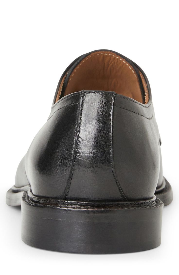 This cap-toe derby is cut from premium Italian leather. Lace-up style Leather upper and lining/leather and rubber sole Made in Italy Business Casual Cap Toe Oxfords With Rubber Sole, Timeless Cap Toe Dress Shoes For Derby, Black Calf Leather Oxfords For Derby, Classic Cap Toe Dress Shoes With Rubber Sole, Derby Oxfords With Almond Toe And Leather Lining, Timeless Cap Toe Leather Shoes For Derby, Cap Toe Oxfords With Leather Sole, Masculine Cap Toe Oxfords With Leather Sole, Almond Toe Oxfords With Leather Lining For Derby