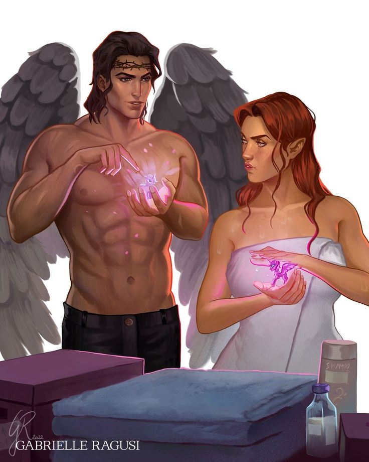 a man and woman standing next to each other in front of an angel's wing