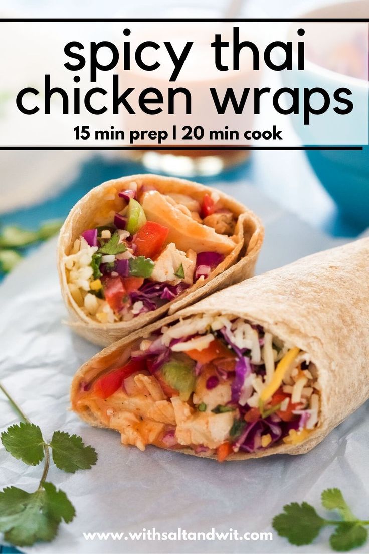 the wrap is cut in half and ready to be eaten with text overlay that reads spicy thai chicken wraps