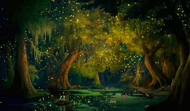 the fireflies are flying in the night sky above water and trees with lights on them