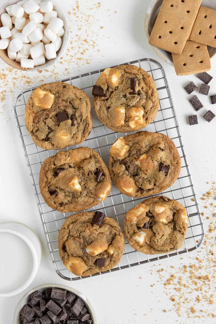 chocolate chip cookies and marshmallows on a cooling rack