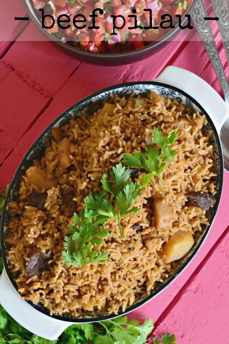 a dish with rice and vegetables in it on a pink surface next to a spoon