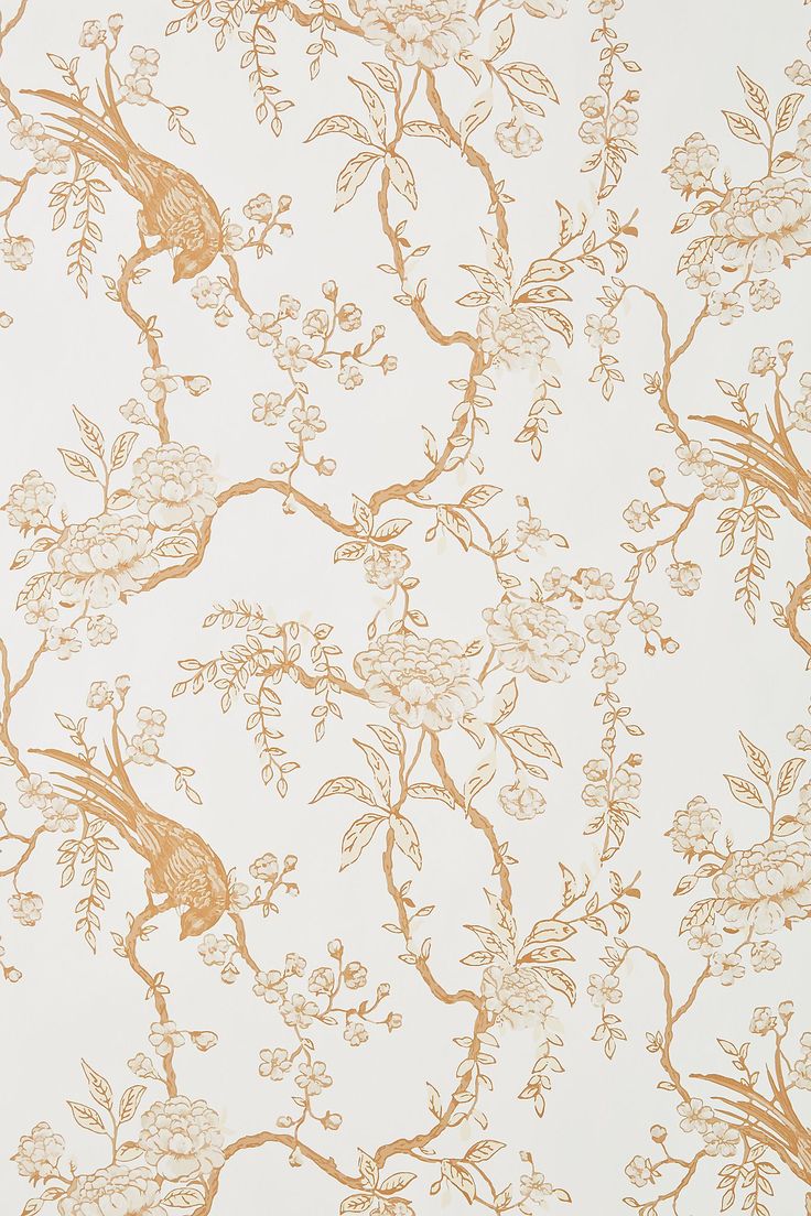 the wallpaper is gold and white with birds on branches, flowers, and leaves