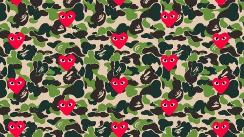 a camouflage pattern with red hearts on the front and green leaves on the back, all over