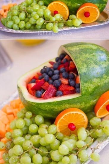 there is a watermelon boat made out of fruit