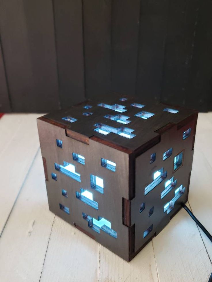 a cube shaped object sitting on top of a table