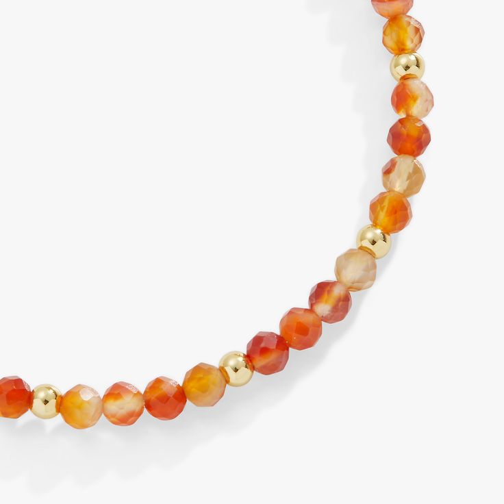 Accent your fall stack with this festival of fall-colored carnelian beads on a shiny expandable wire bangle bracelet. Expandable from 2" to 3.5" Finishes: Shiny Silver, Shiny Gold, Shiny Chocolate Nickel-free Adorned with genuine multi-color Carnelian gemstones; colors may vary due to natural makeup of the gemstones Adjustable Orange Beaded Bracelets With Natural Stones, Adjustable Amber Beaded Bracelets With Faceted Beads, Adjustable Carnelian Beaded Bracelets With Gemstone Beads, Adjustable Orange Natural Stone Beaded Bracelets, Adjustable Beaded Amber Stretch Bracelet, Adjustable Carnelian Jewelry With Faceted Beads, Adjustable Round Amber Stretch Bracelet, Adjustable Amber Faceted Beaded Bracelets, Orange Stackable Jewelry With Round Beads