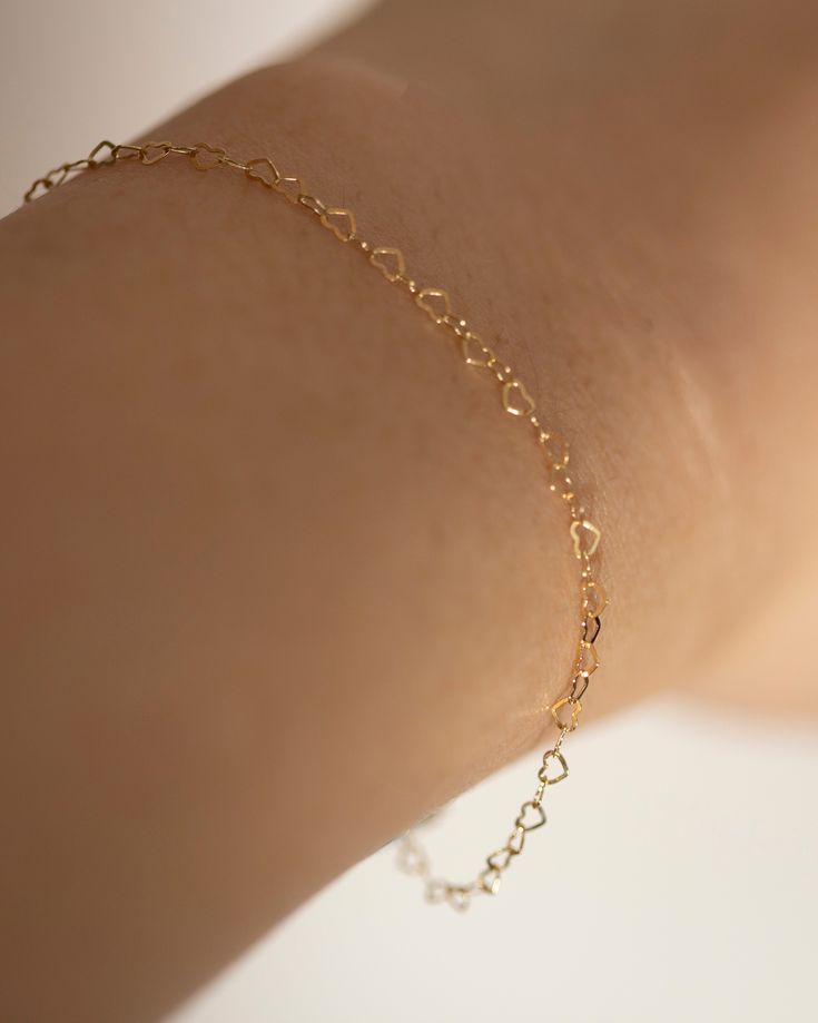 Perfect Valentines gift for that special someone.Mini heart link chain bracelet.Material:• 14k gold filled Size:• Mini heart measures about 3x2mmPerfect for adding a shine to your outfit.Simple and delicate bracelet - Perfect for Stacking & Layering or even alone. Dainty Delicate Chain Bracelets For Valentine's Day, Dainty Heart Bracelet With Delicate Chain For Valentine's Day, Dainty Delicate Chain Bracelet For Valentine's Day, Elegant Hypoallergenic Chain Bracelet For Valentine's Day, Elegant Hypoallergenic Heart Bracelet For Everyday, Hypoallergenic Dainty Heart Bracelet, Elegant Everyday Hypoallergenic Heart Bracelet, Dainty Bracelets With Adjustable Chain For Valentine's Day, Minimalist Adjustable Chain Bracelet For Valentine's Day