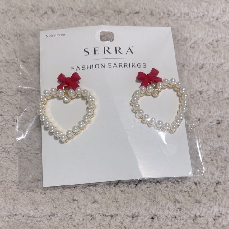 Pearl Earrings Red Ribbons Heart Shaped Never Worn- In Package White Heart Drop Earrings For Party, White Earrings For Valentine's Day Party, White Heart Charm Earrings For Party, White Heart Charm Earrings For Valentine's Day, Valentine's Day White Heart Charm Earrings, Cute White Heart Earrings For Party, White Heart Beads Earrings For Party, White Heart Bead Earrings For Party, Party Heart Beads White Earrings