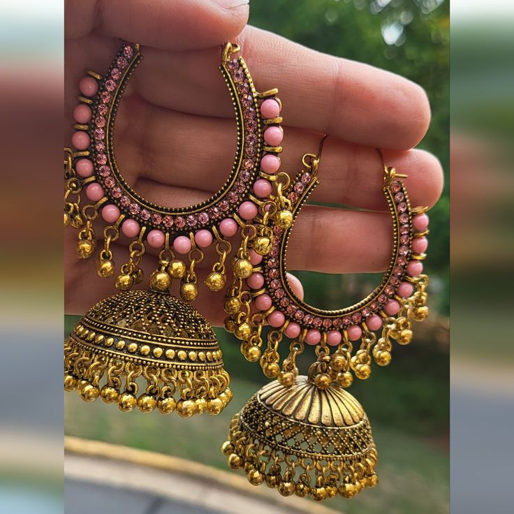 Whether You're Attending A Cultural Event, A Wedding, Or Simply Seeking To Infuse Your Look With A Dash Of Indian Elegance, Our Jhumka Gold Antique Color Earrings Are The Ideal Choice. Let Your Ears Become A Canvas For These Masterpieces As They Sway Gracefully, Enchanting Everyone Around You. Experience The Essence Of Tradition And Beauty In Every Wear With These Alluring Indian Jhumka Earrings, An Embodiment Of The Rich Cultural Heritage That Continues To Captivate Hearts." Indian Jhumka, David Yurman Earrings, Gold Jhumka, Multicolor Earrings, Color Earrings, Brown Texture, Cultural Events, Jhumka Earrings, Pearl Stud Earrings