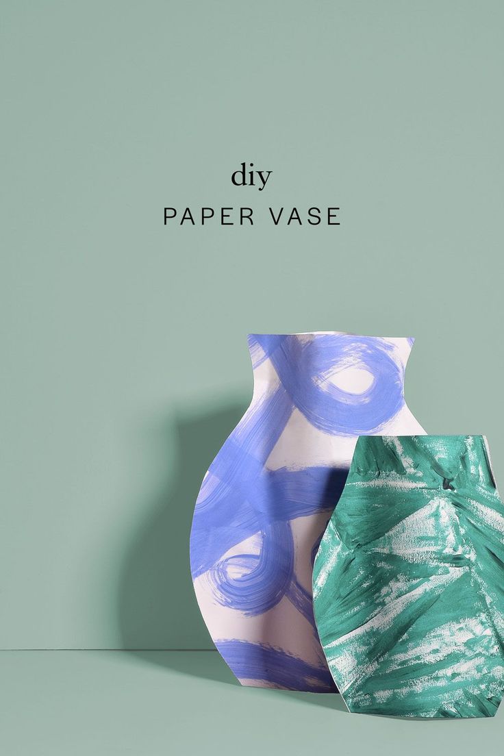 two vases sitting next to each other on a green background with the words diy paper vase