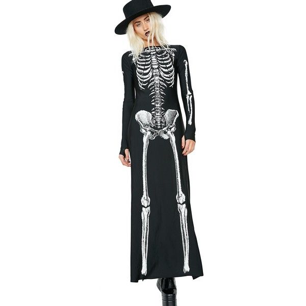 a woman wearing a skeleton costume