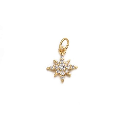 Gouden bedeltje van een morningstar met zirconia kristalletjes. Gold Charm Necklace With Cubic Zirconia, Dainty Gold Star Charm, Everyday Star-shaped Jewelry With Charms, Gold Dangle Jewelry With Star Charm, Yellow Gold Star Charm Pendant Necklace, Cubic Zirconia Jewelry With Star Charm For Gift, Cubic Zirconia Dangle Jewelry With Star Charm, Starburst Cubic Zirconia Jewelry Gift, Cubic Zirconia Jewelry With Star Charm As Gift