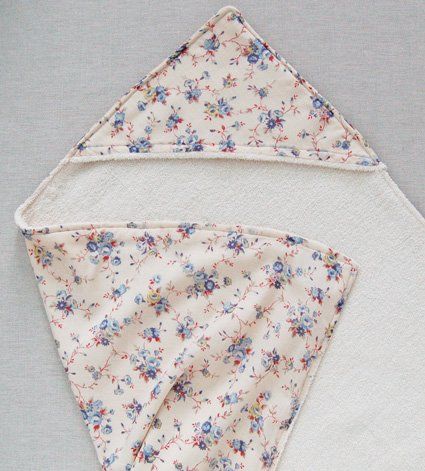 three pieces of cloth on top of each other, one with a flowered design