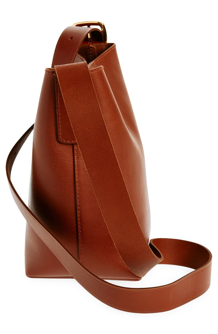 Madewell's newest leather bag collection is cool, modern and quietly luxe. With a magnetic closure and interior pocket, the mini bucket tote is perfectly sized to hold your phone, wallet, keys and more—plus, it has a shoulder strap and adjustable crossbody strap. It's so good, it's essential. Structured silhouette with flat base for stability Leather Imported Modern Bucket Bag With Leather Handles For On-the-go, Elegant Cognac Bucket Bag For On-the-go, Cognac Bucket Bag For On-the-go, Chic Bucket Bag With Smooth Grain For Work, Everyday Bucket Bag With Magnetic Closure, Rectangular Smooth Grain Bucket Bag For Work, Versatile Bucket Bag With Smooth Grain For Everyday Use, Versatile Bucket Bag With Magnetic Closure For Everyday Use, Smooth Grain Top Handle Bucket Bag For Work