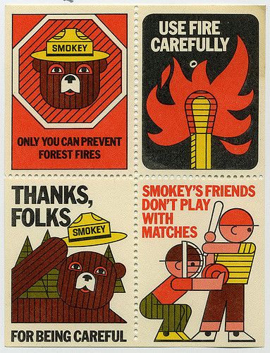 four stickers depicting different types of fire safety