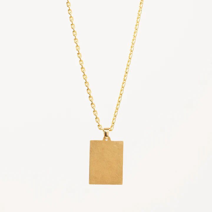 Golden Lola Pendant Necklace – Gwen Beloti Collection Minimalist Matte Gold-plated Jewelry, Minimalist Engraved Brass Jewelry, Modern Brass Necklace With Delicate Chain, Minimalist Jewelry With Square Pendant And Adjustable Chain, Modern Necklace With Adjustable Chain And Square Pendant, Modern Gold Plated Oval Pendant Necklace, Modern Gold Necklace With Square Pendant, Modern Jewelry With Large Rectangular Pendant, Classic Rectangular Pendant Necklace Tarnish Resistant