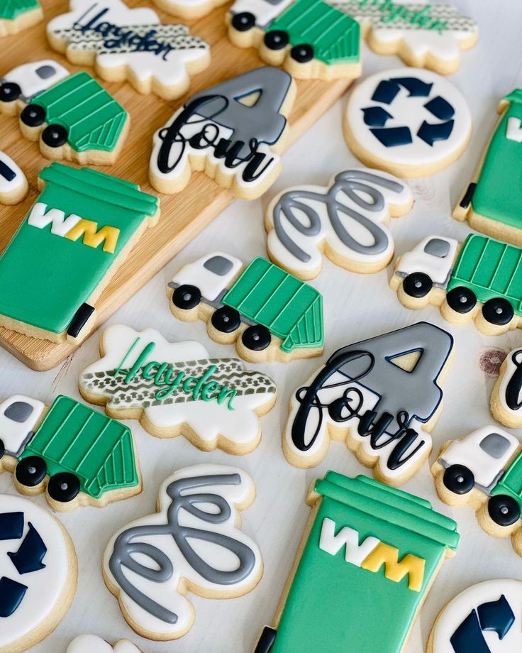 decorated cookies are displayed on a table